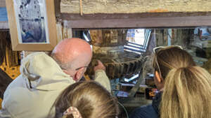 Students looking at Pit Wheel